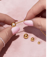 By Sofia Wistam kedja guldpläterad mässing