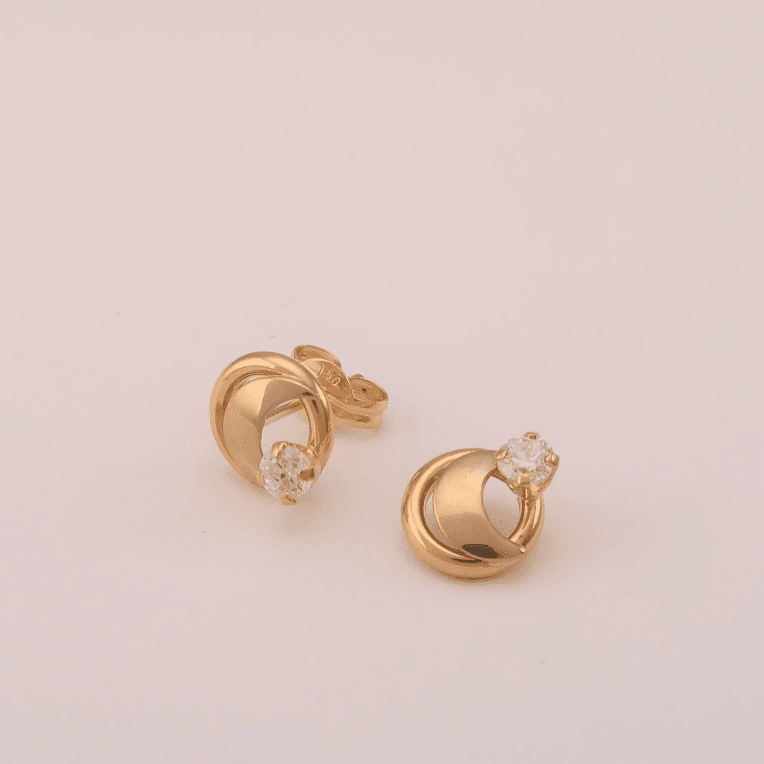 Guld Carlsèn Örhänge rg 18 k med cubik zirkon