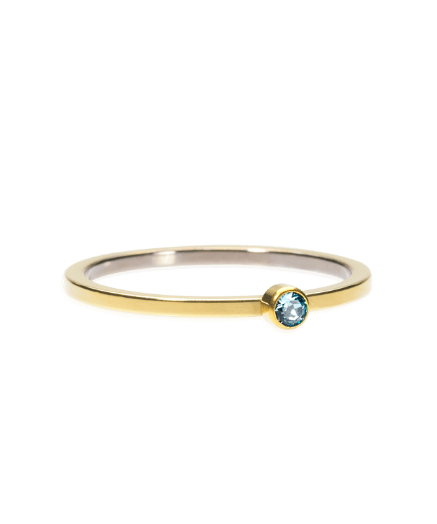 Blomdahl Bezel Tiny ring med aquamarine golden titanium